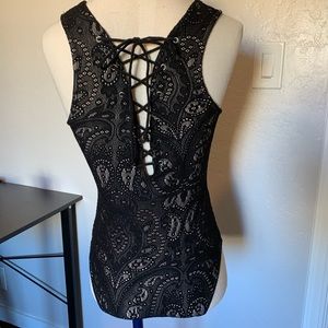 Kendall and Kylie black lace bodysuit